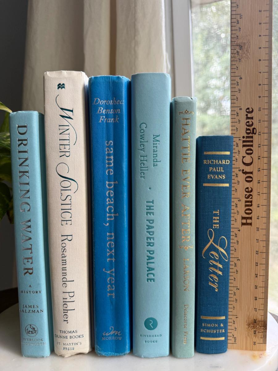 Curated collection of soft blue, aqua, seafoam, and muted coastal-toned books.