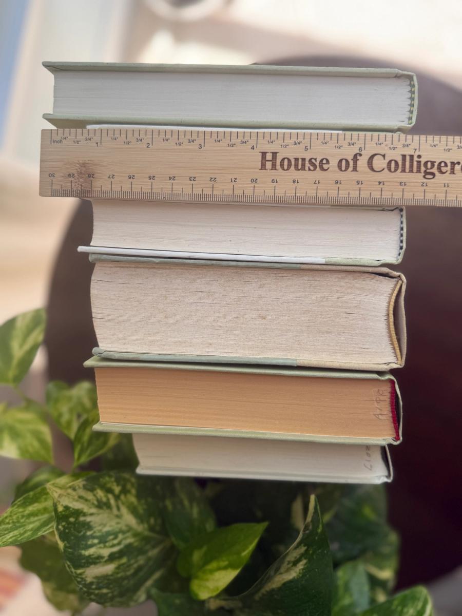 Curated collection of green books ranging from soft sage and olive to deeper botanical tones.