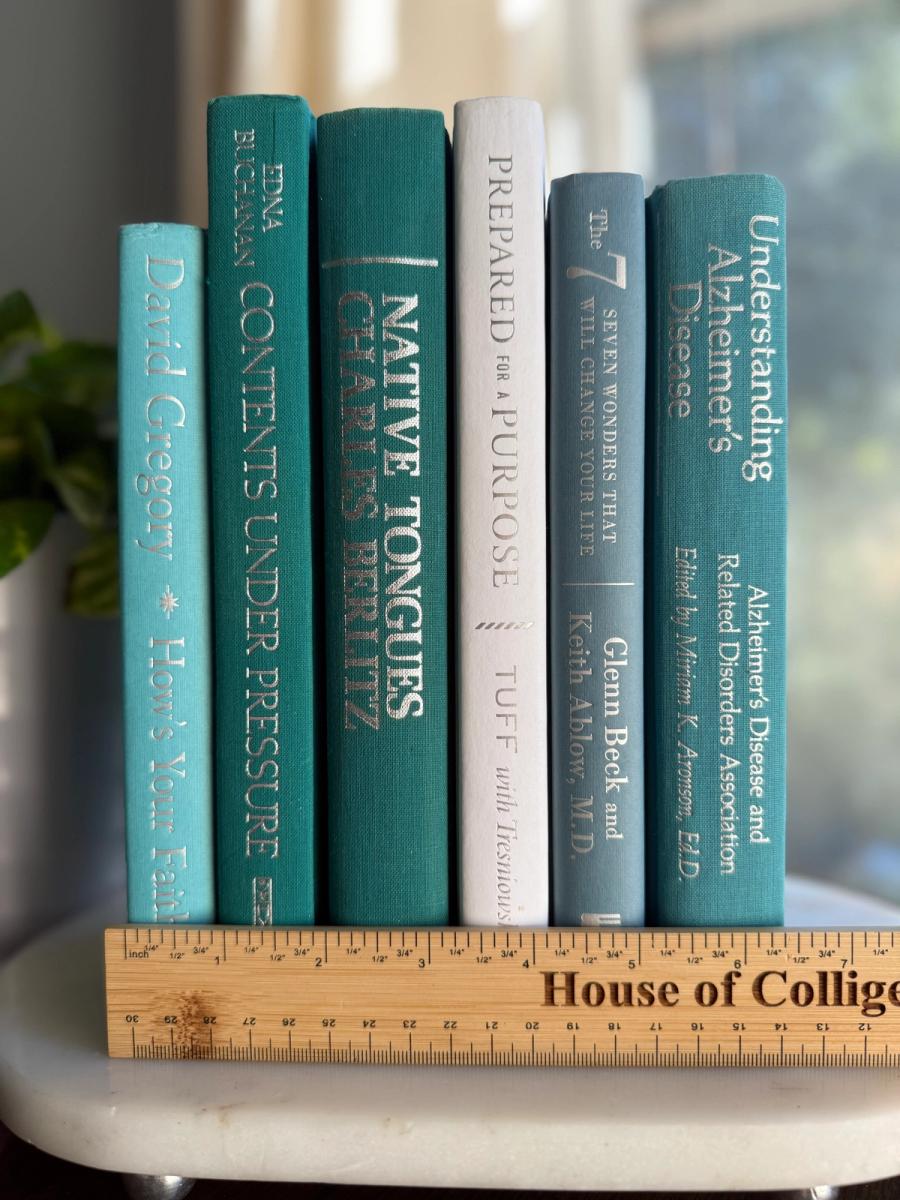 Curated collection of soft blue, aqua, seafoam, and muted coastal-toned books.