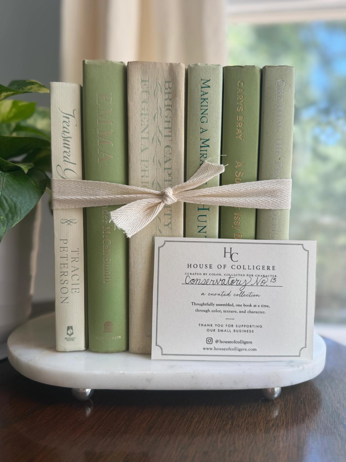Curated collection of green books ranging from soft sage and olive to deeper botanical tones.