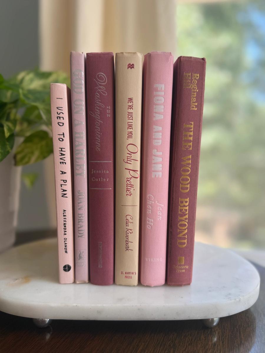 Curated collection of blush, dusty rose, warm taupe, and softly muted neutral books.