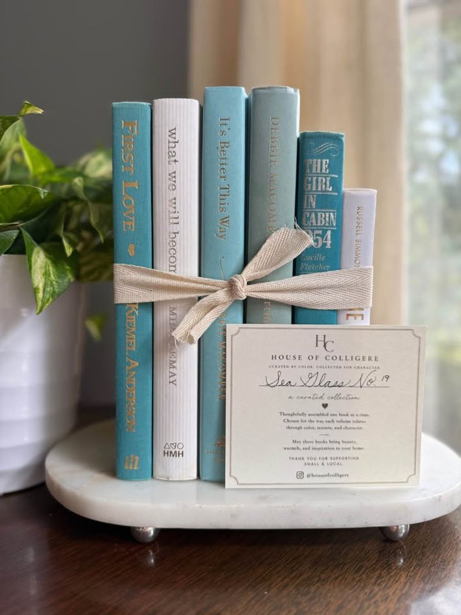 Curated collection of soft blue, aqua, seafoam, and muted coastal-toned books.