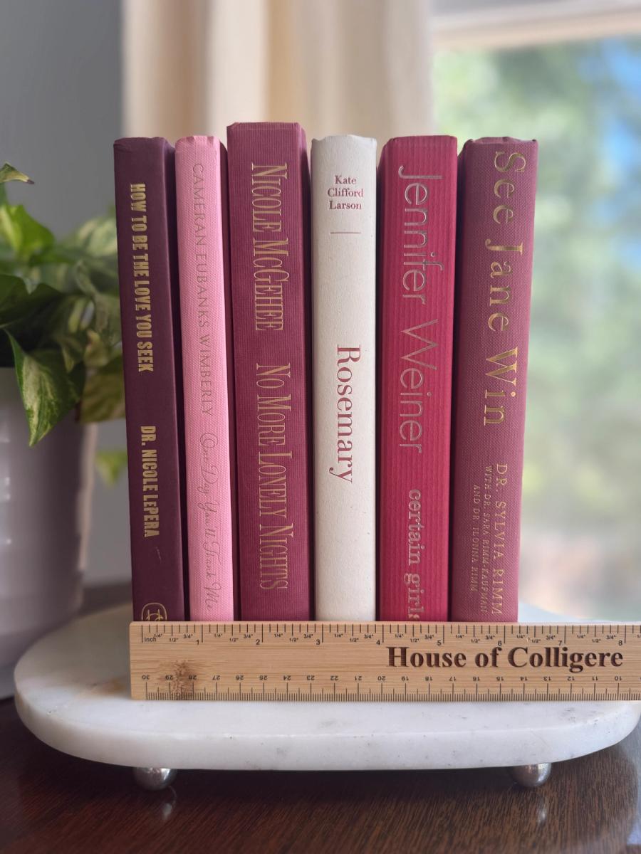 Curated collection of blush, dusty rose, warm taupe, and softly muted neutral books.