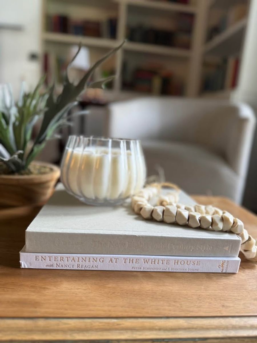 Coffee Table Design, White, beige, almond, linen-like cloth covers, matte woven texture, subtle gold and metallic lettering, understated traditional styling