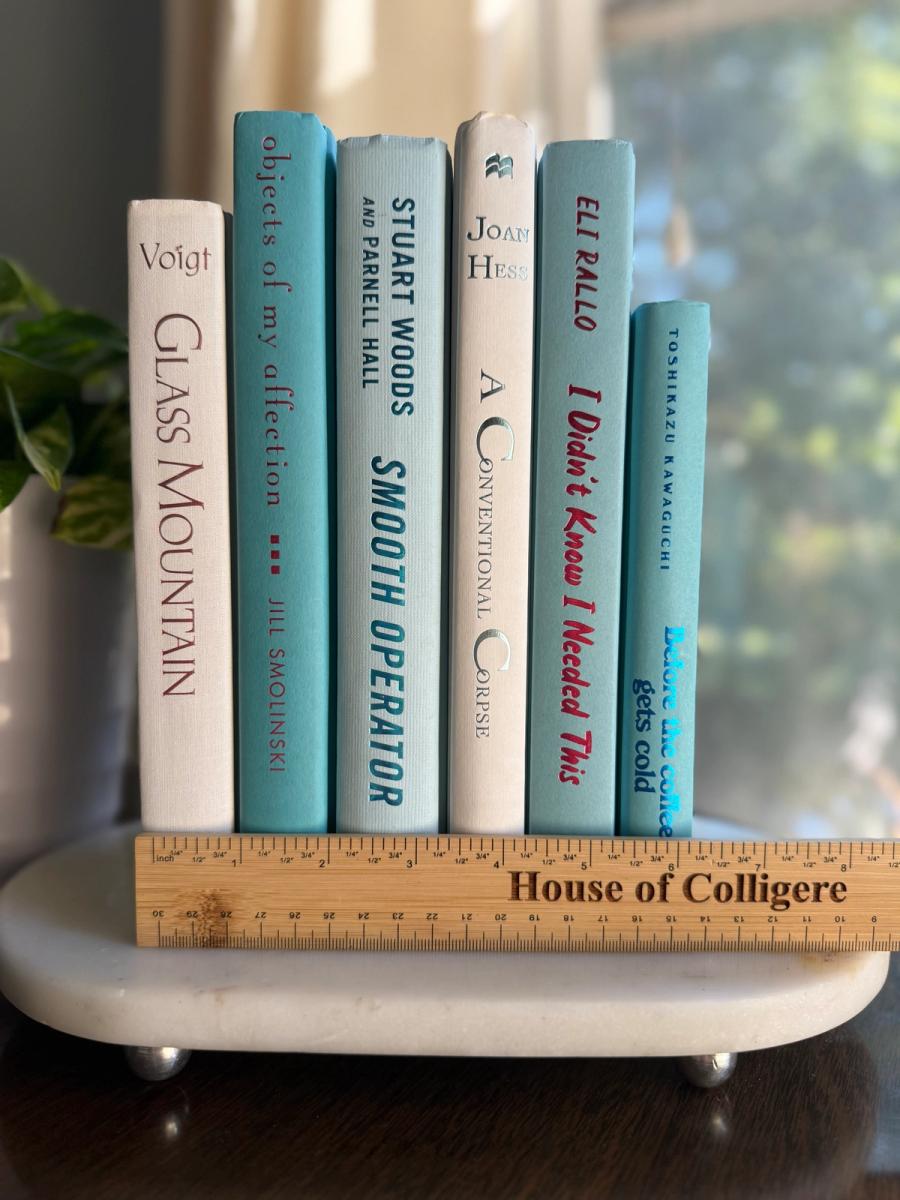 Curated collection of soft blue, aqua, seafoam, and muted coastal-toned books.