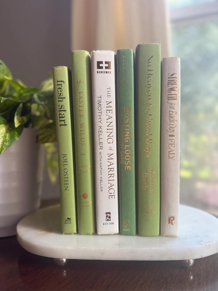 Curated collection of green books ranging from soft sage and olive to deeper botanical tones.