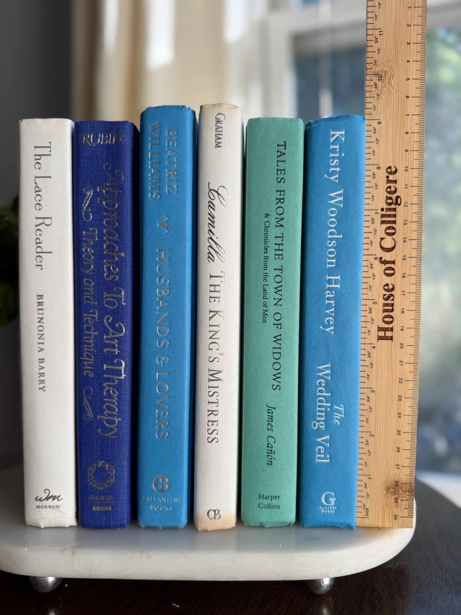 Curated collection of soft blue, aqua, seafoam, and muted coastal-toned books.