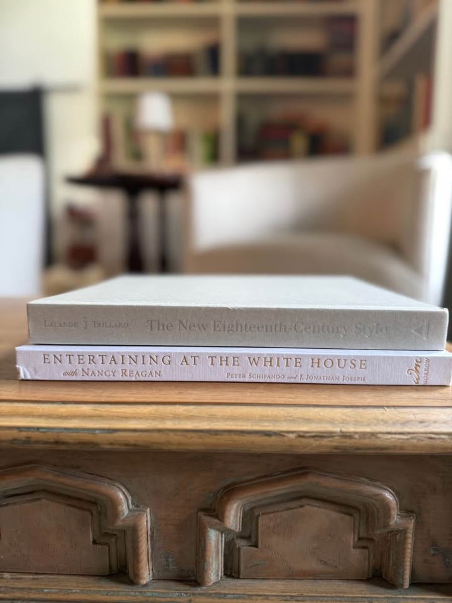 Coffee Table Design, White, beige, almond, linen-like cloth covers, matte woven texture, subtle gold and metallic lettering, understated traditional styling
