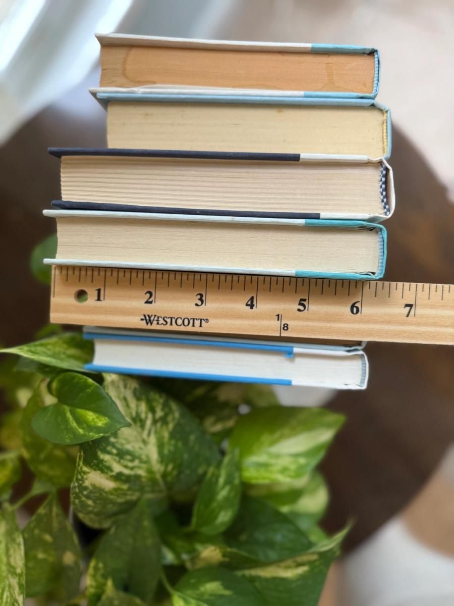Curated collection of soft blue, aqua, seafoam, and muted coastal-toned books.