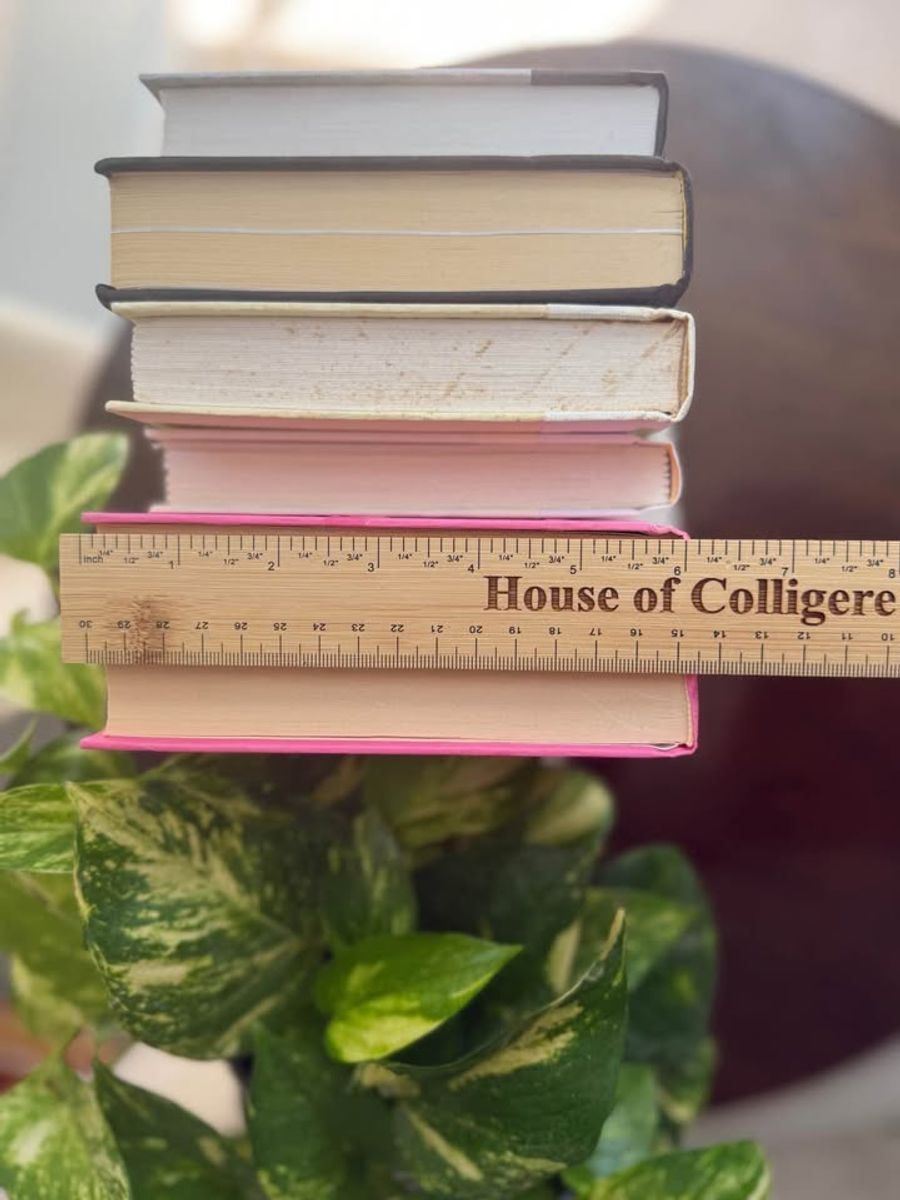 A bold, graphic collection of six hardcover books curated in vivid pink, crisp ivory, and deep black. Clean typography, strong contrast, and varied cloth textures give this one-of-a-kind set a modern, editorial feel. 
