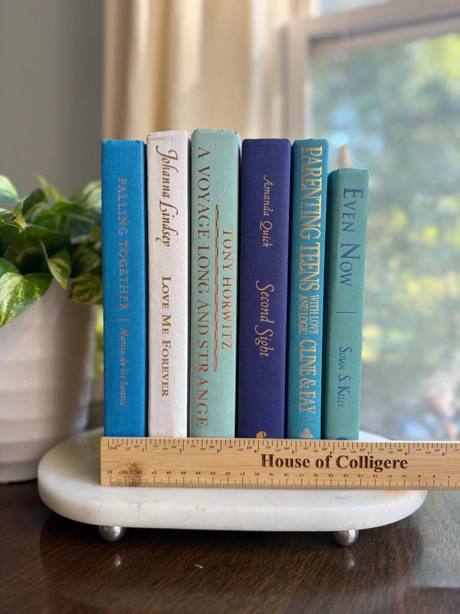 Curated collection of soft blue, aqua, seafoam, and muted coastal-toned books.