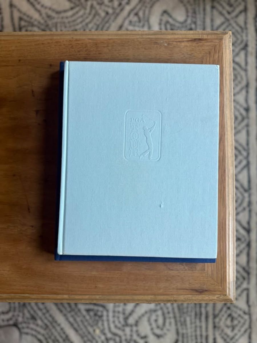 Coffee Table Design, Blue, Navy, Sky, linen-like cloth covers, matte woven texture, subtle gold and metallic lettering, understated traditional styling