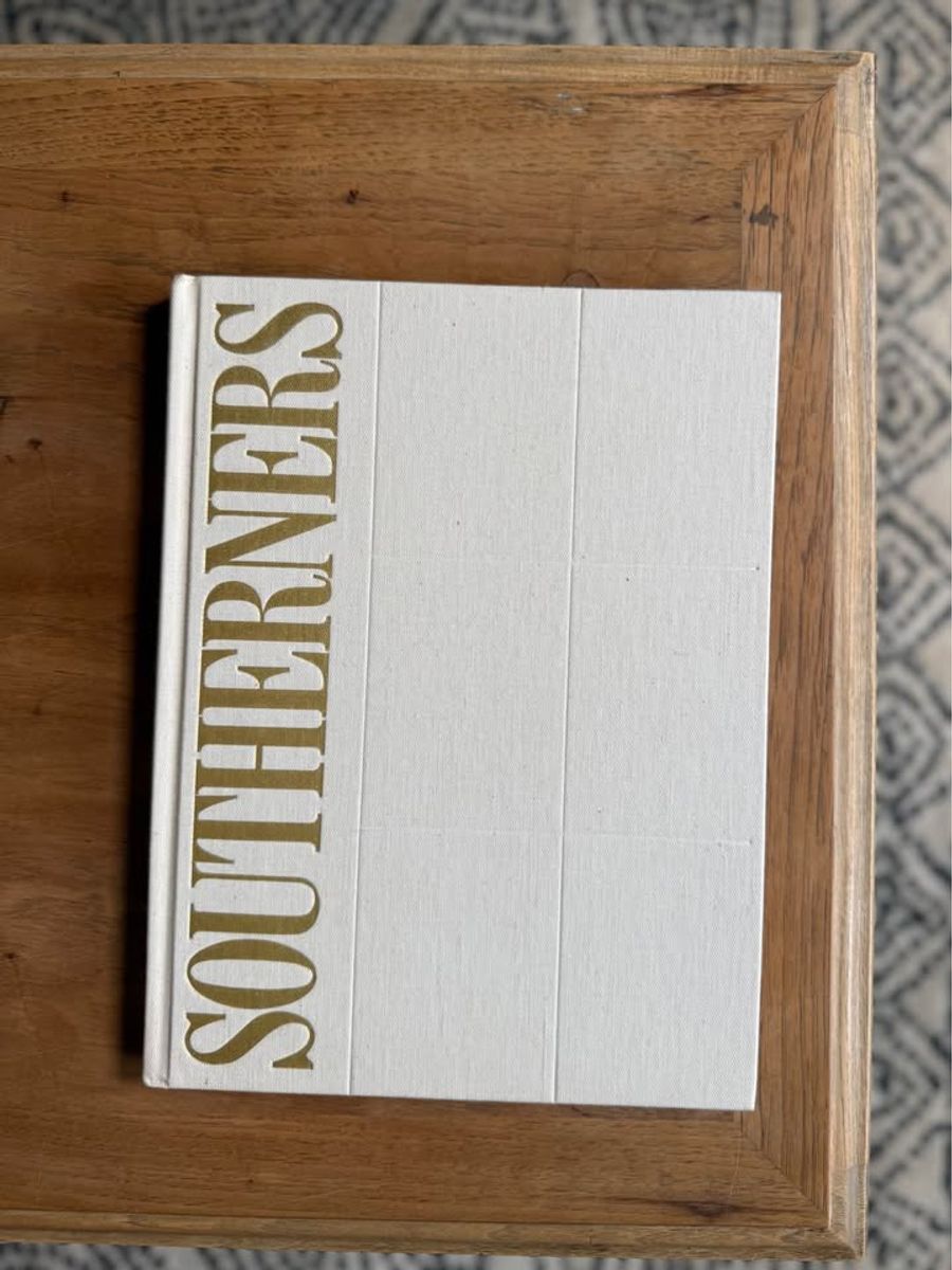 Coffee Table Design, White, beige, almond, linen-like cloth covers, matte woven texture, subtle gold and metallic lettering, understated traditional styling
