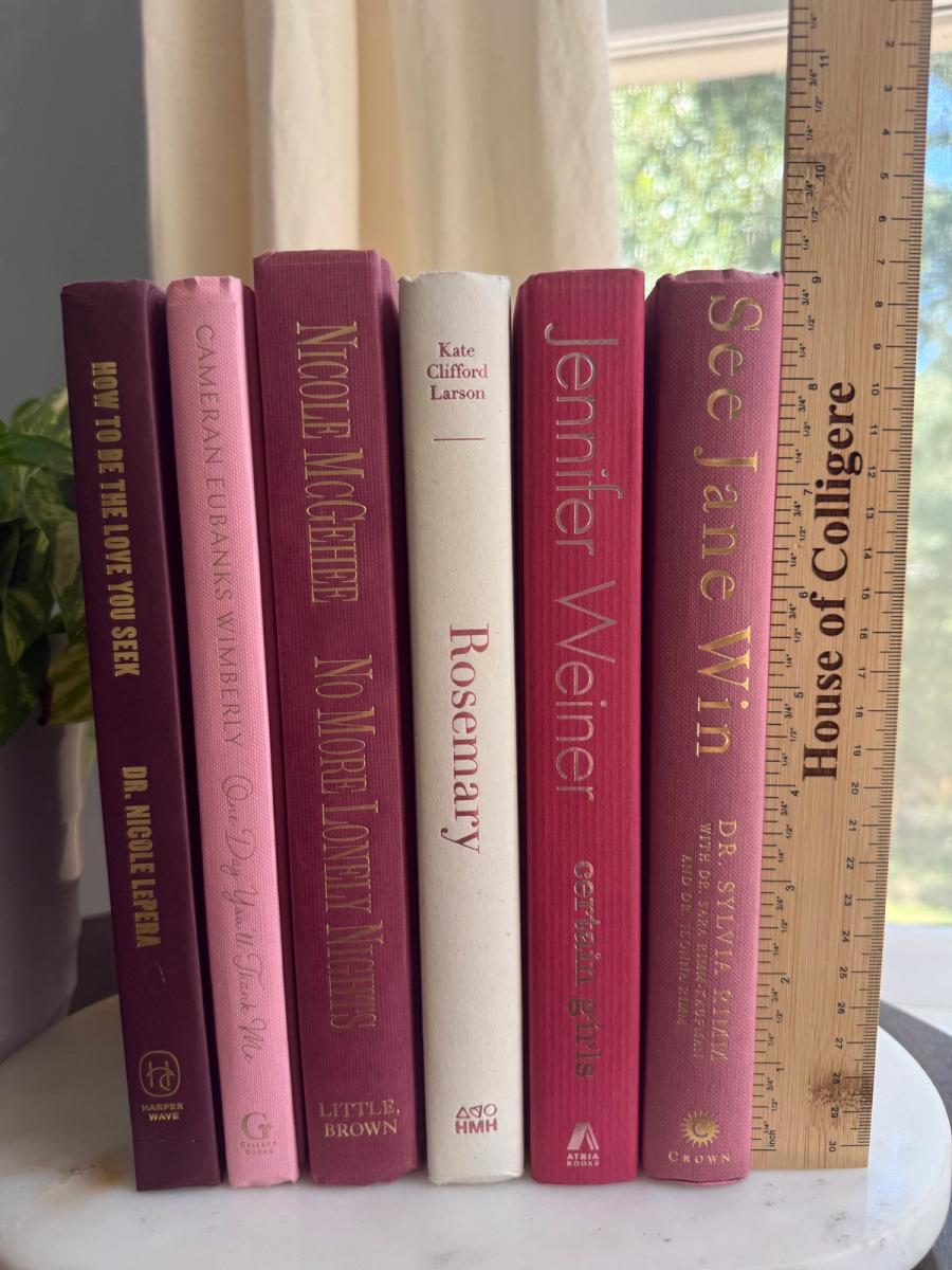 Curated collection of blush, dusty rose, warm taupe, and softly muted neutral books.