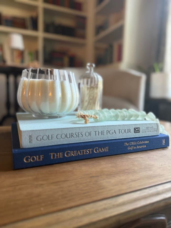Coffee Table Design, Blue, Navy, Sky, linen-like cloth covers, matte woven texture, subtle gold and metallic lettering, understated traditional styling