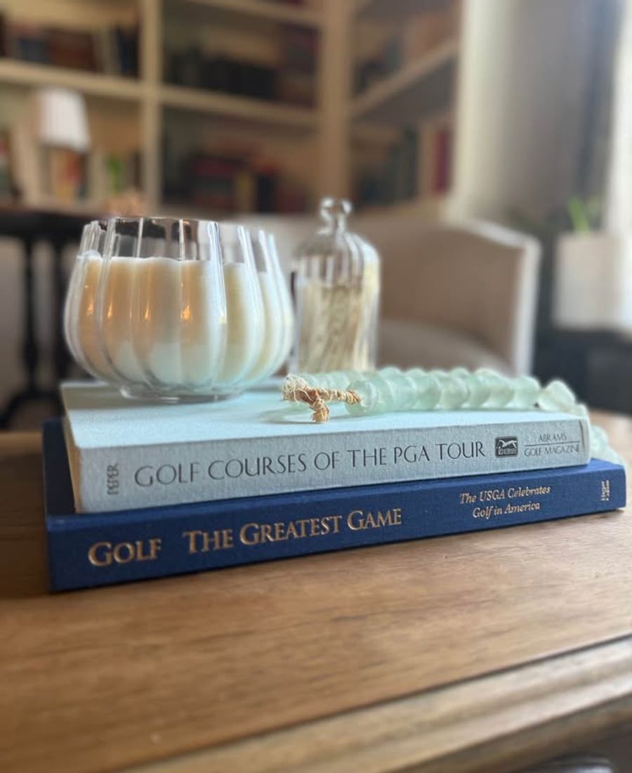 Coffee Table Design, Blue, Navy, Sky, linen-like cloth covers, matte woven texture, subtle gold and metallic lettering, understated traditional styling