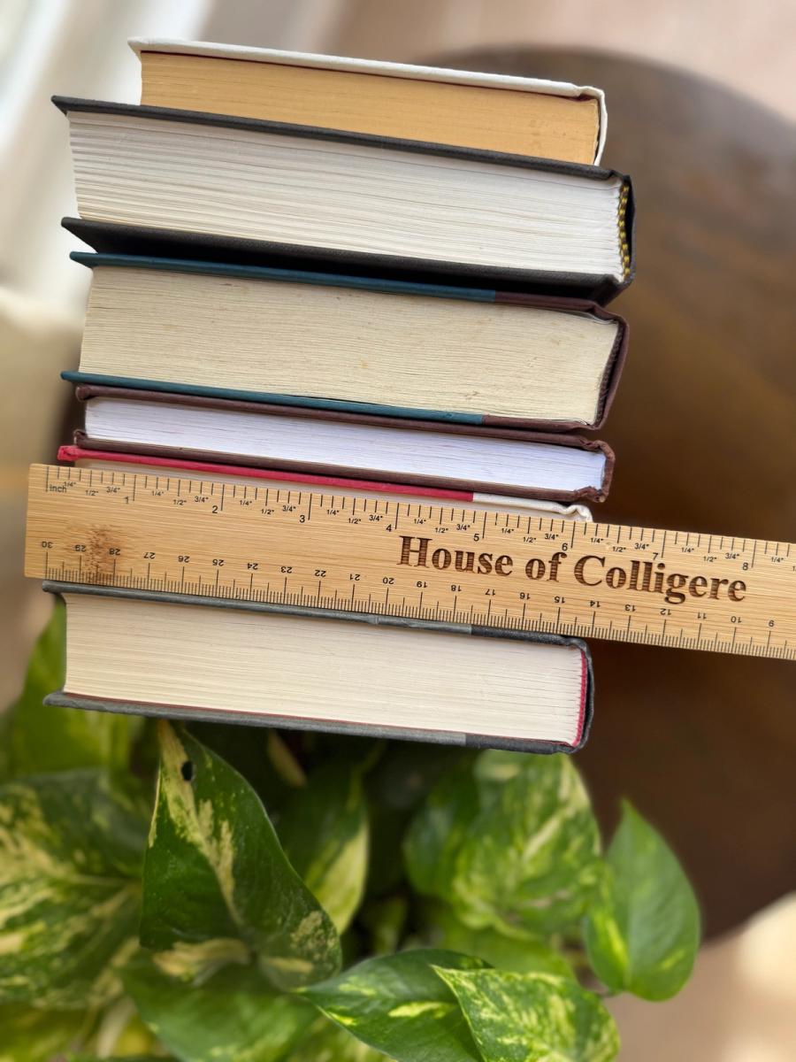 Curated collection of warm brown, olive, tan, and aged neutral books with a traditional library palette.