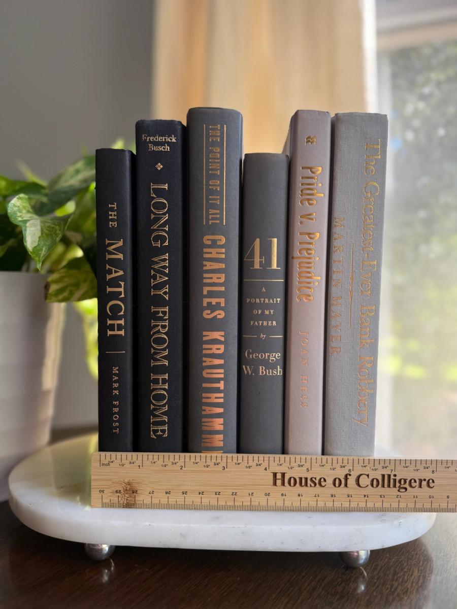 Curated collection of warm brown, olive, tan, and aged neutral books with a traditional library palette.