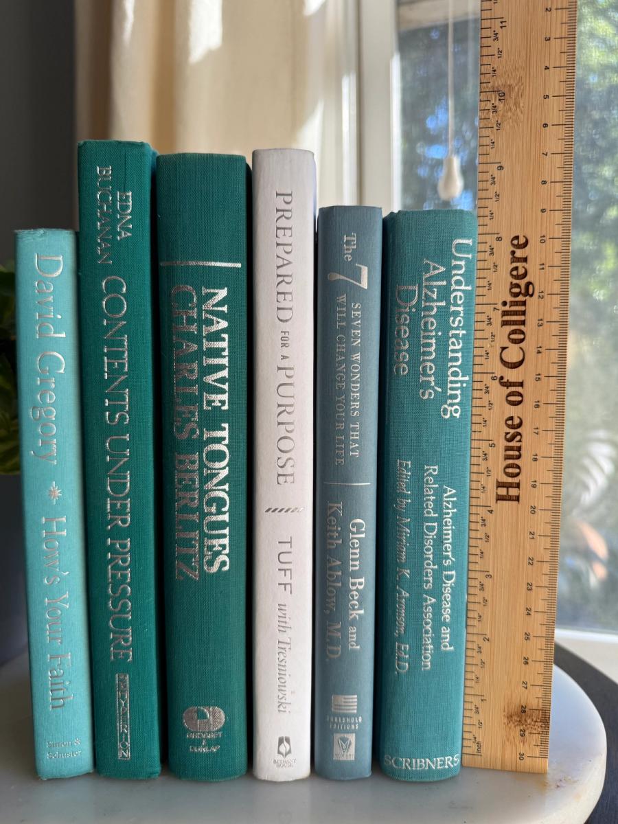 Curated collection of soft blue, aqua, seafoam, and muted coastal-toned books.