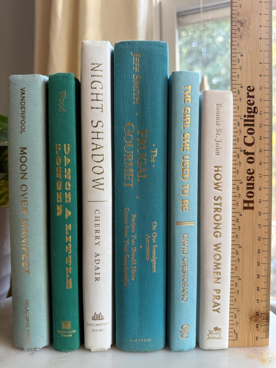 Curated collection of soft blue, aqua, seafoam, and muted coastal-toned books.