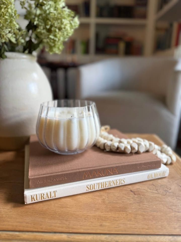 Curated set of oversized hardcover coffee table books selected to work together in scale, color, and visual character.
