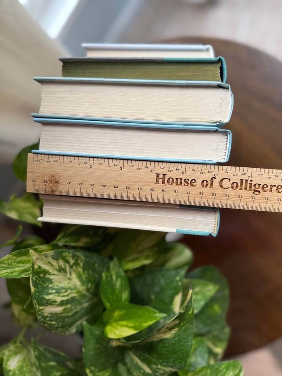 Curated collection of soft blue, aqua, seafoam, and muted coastal-toned books.