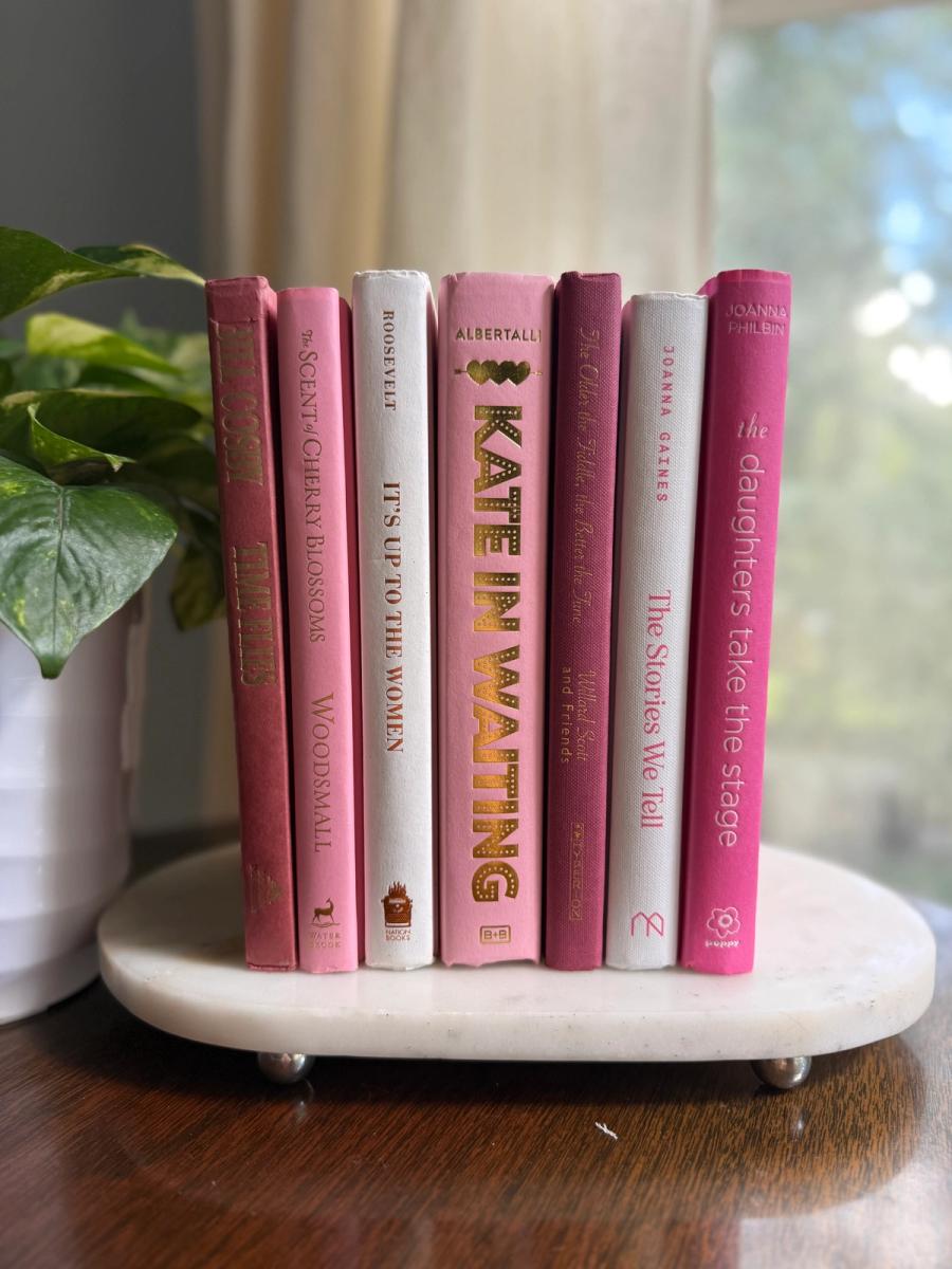 Curated collection of blush, dusty rose, warm taupe, and softly muted neutral books.