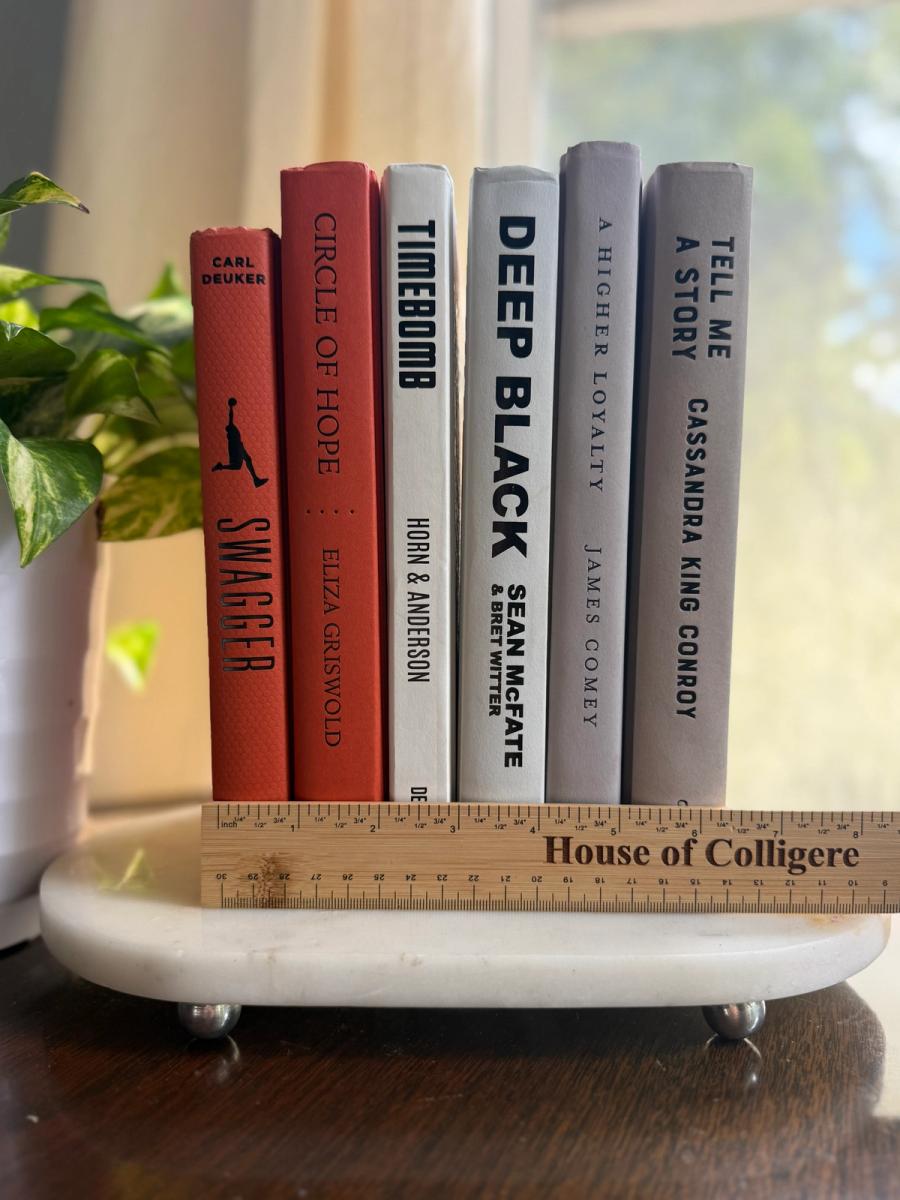 Six curated hardcover books in coral, ivory, soft gray, and muted lavender tones, tied with natural linen ribbon and displayed with a House of Colligere Modernist Edit No. 6 card