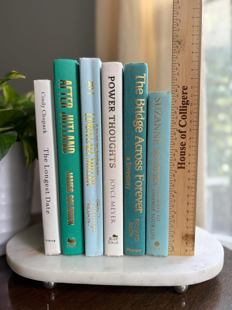 Curated collection of soft blue, aqua, seafoam, and muted coastal-toned books.