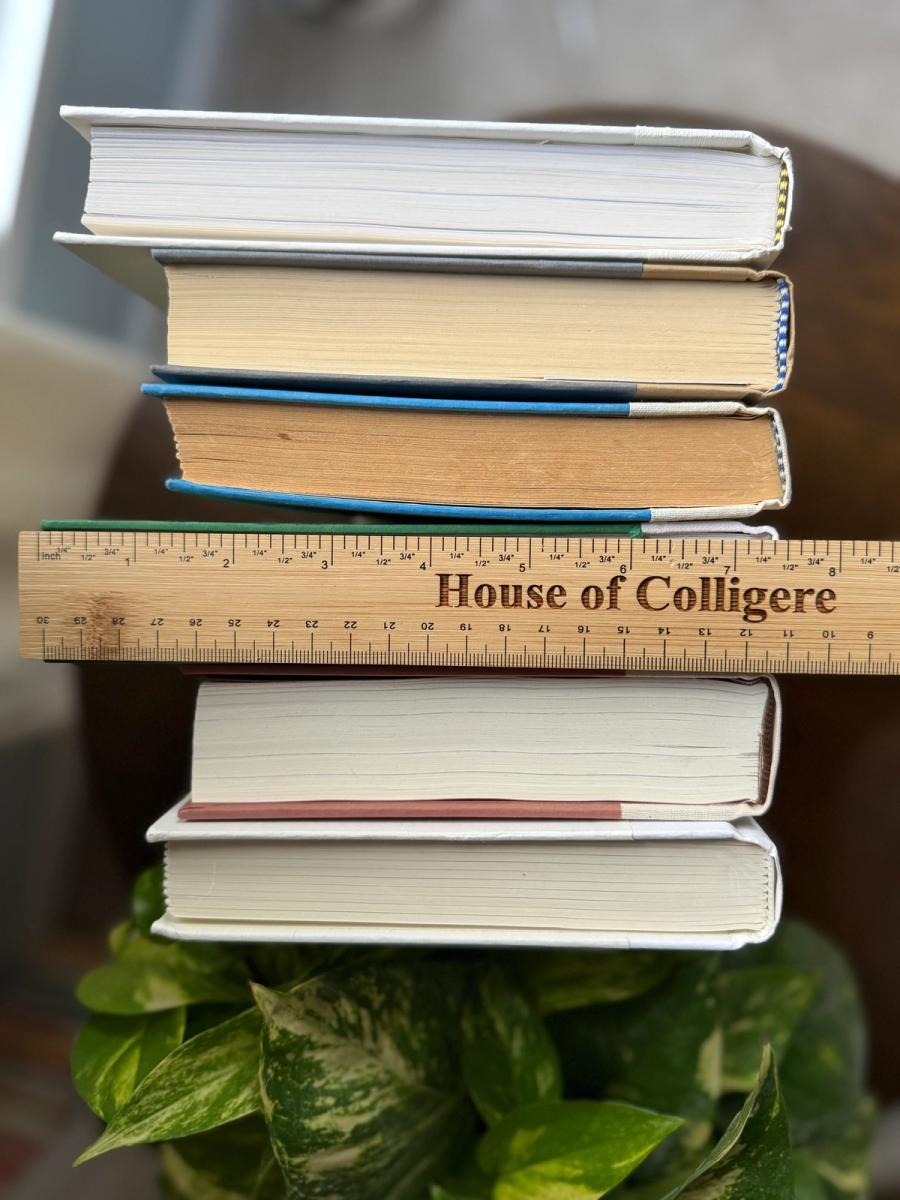 Curated collection of crisp white, ivory, and warm cream books with soft neutral tones.