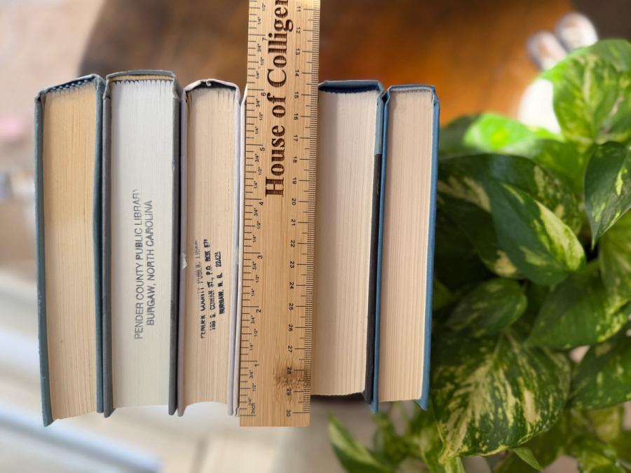 Curated collection of muted blue-gray, slate, charcoal, and softly weathered neutral books.