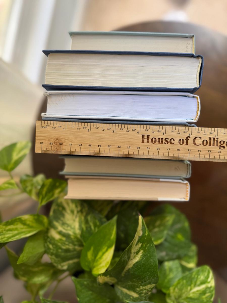 Curated collection of layered blue books ranging from pale coastal blue to deeper ocean tones.