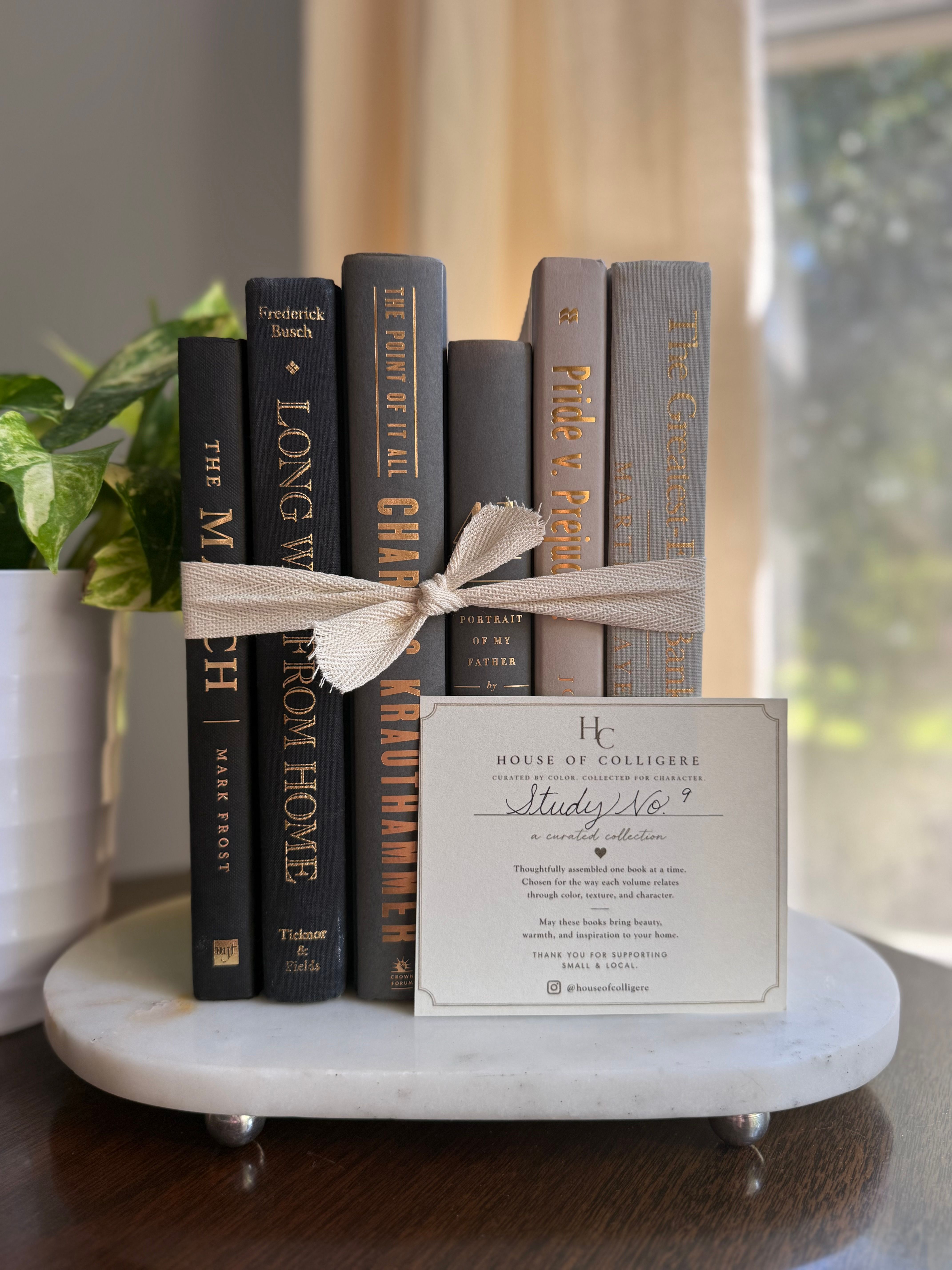Curated collection of warm brown, olive, tan, and aged neutral books with a traditional library palette.