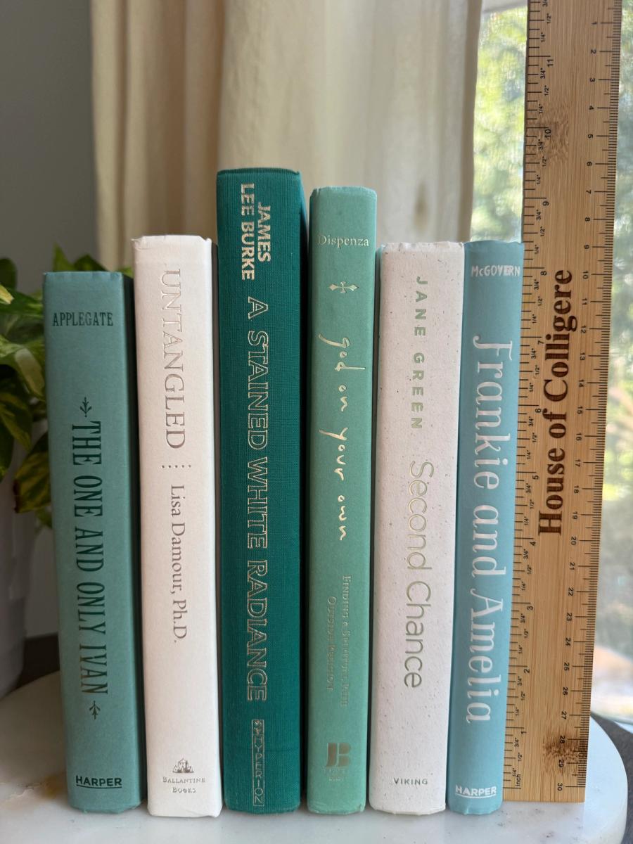 Curated collection of soft blue, aqua, seafoam, and muted coastal-toned books.