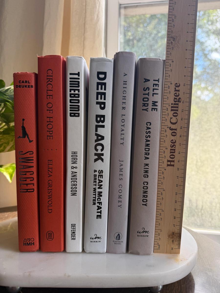 Six curated hardcover books in coral, ivory, soft gray, and muted lavender tones, tied with natural linen ribbon and displayed with a House of Colligere Modernist Edit No. 6 card