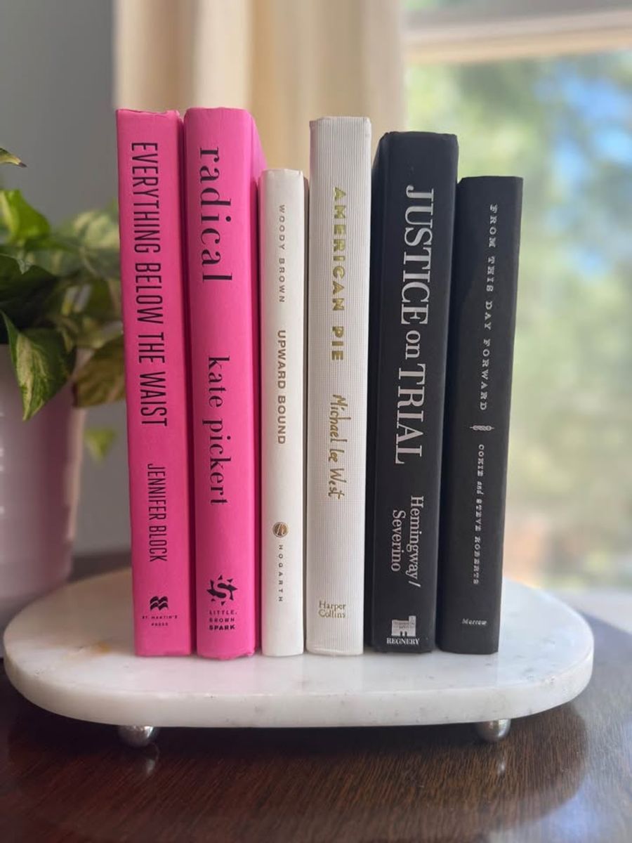 A bold, graphic collection of six hardcover books curated in vivid pink, crisp ivory, and deep black. Clean typography, strong contrast, and varied cloth textures give this one-of-a-kind set a modern, editorial feel. 
