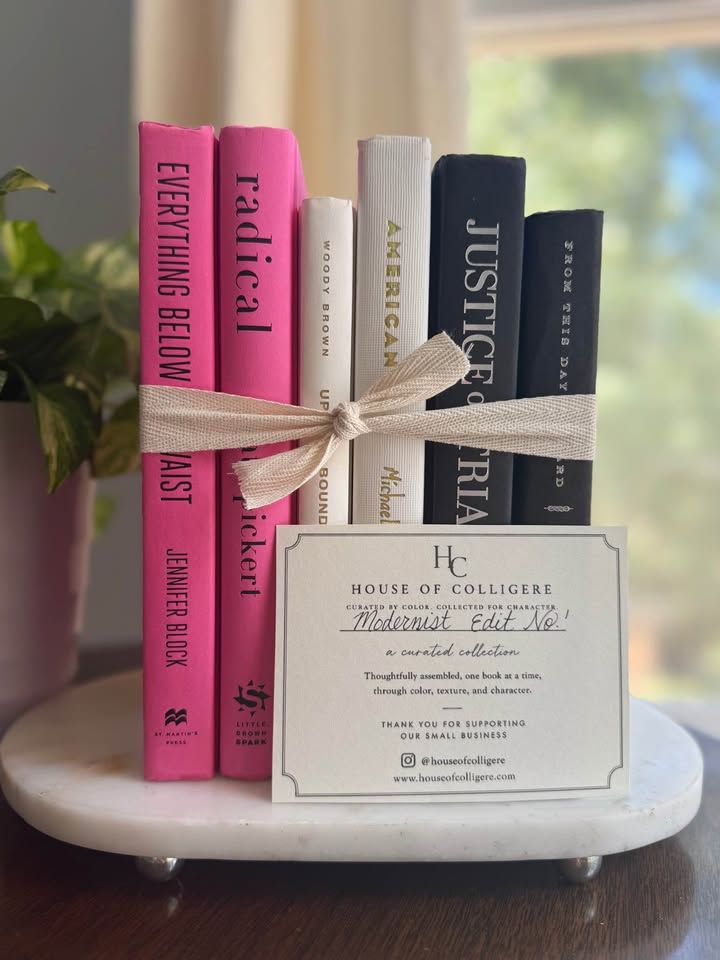A bold, graphic collection of six hardcover books curated in vivid pink, crisp ivory, and deep black. Clean typography, strong contrast, and varied cloth textures give this one-of-a-kind set a modern, editorial feel. 