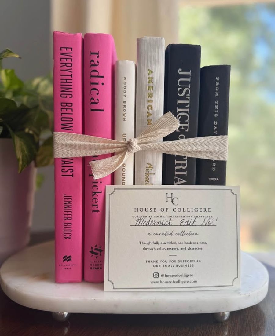 A bold, graphic collection of six hardcover books curated in vivid pink, crisp ivory, and deep black. Clean typography, strong contrast, and varied cloth textures give this one-of-a-kind set a modern, editorial feel.