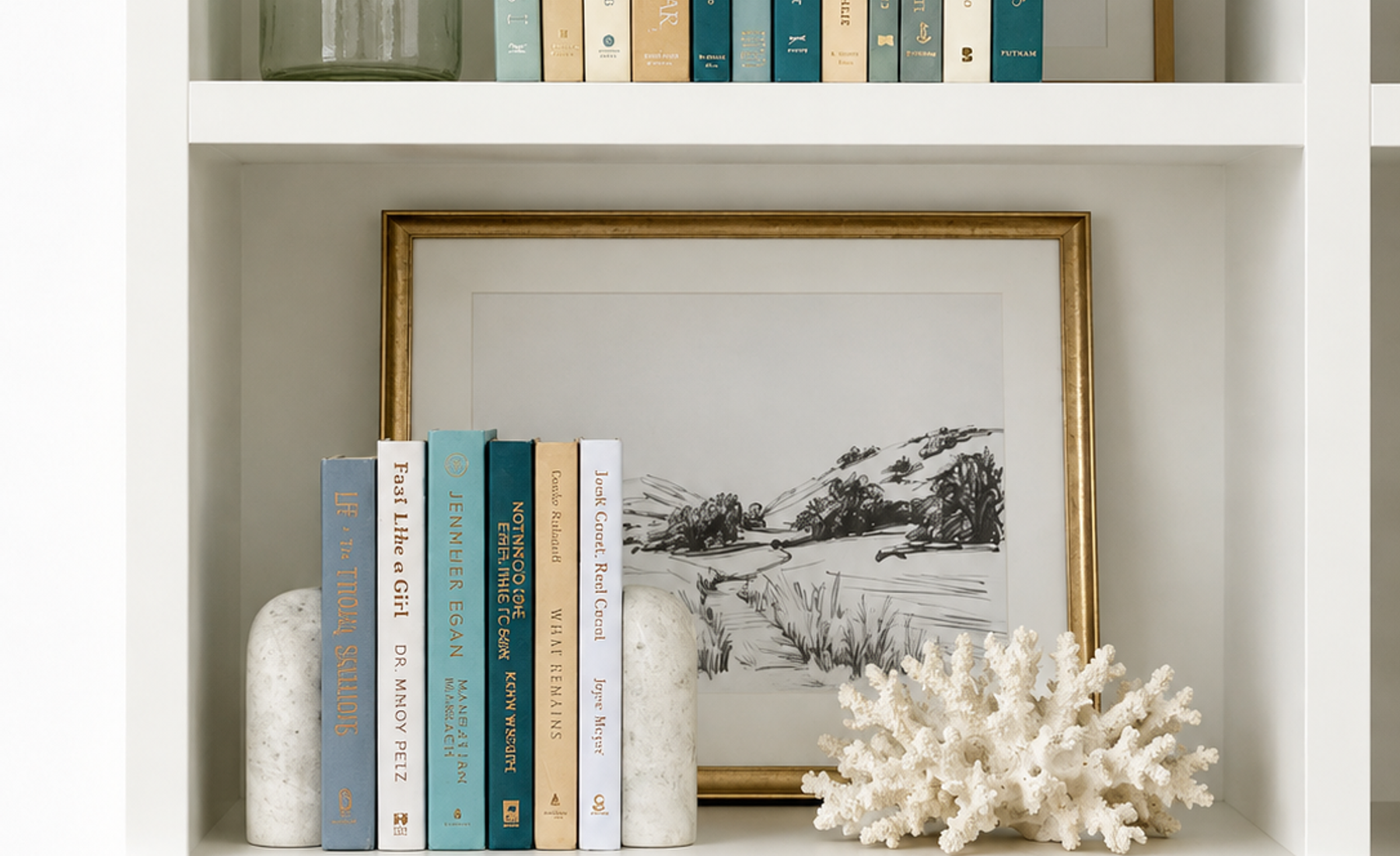 Curated collection of white, pale blue, sand, and soft coastal-neutral books with an airy, sun-faded look.