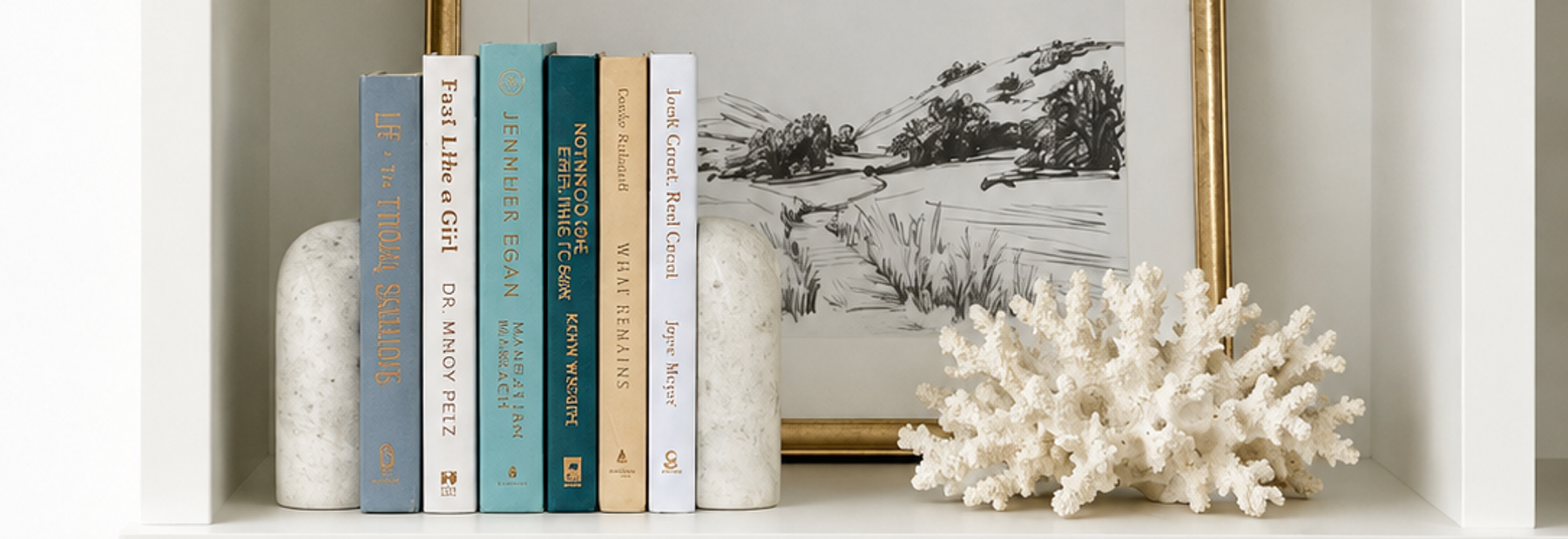 Curated collection of white, pale blue, sand, and soft coastal-neutral books with an airy, sun-faded look.