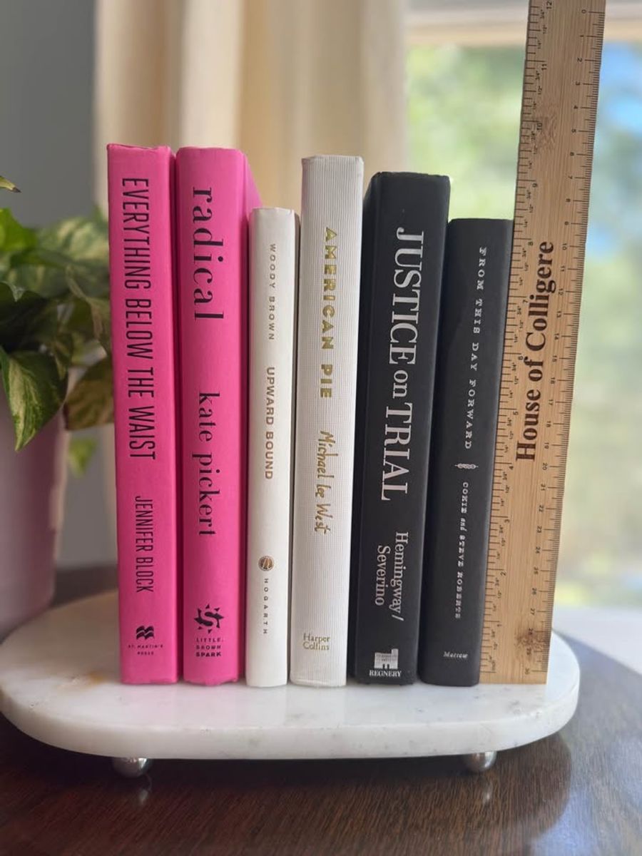 A bold, graphic collection of six hardcover books curated in vivid pink, crisp ivory, and deep black. Clean typography, strong contrast, and varied cloth textures give this one-of-a-kind set a modern, editorial feel. 