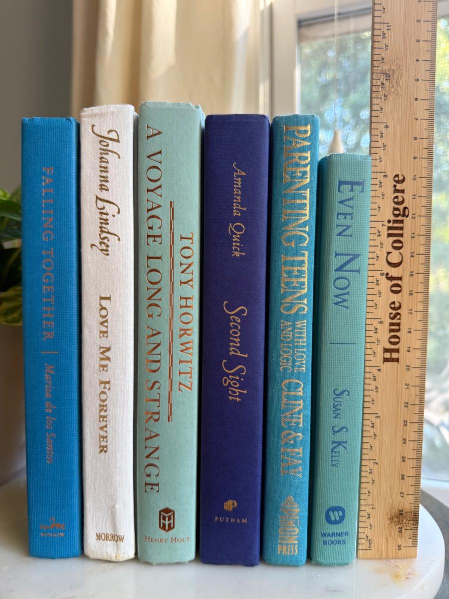 Curated collection of soft blue, aqua, seafoam, and muted coastal-toned books.