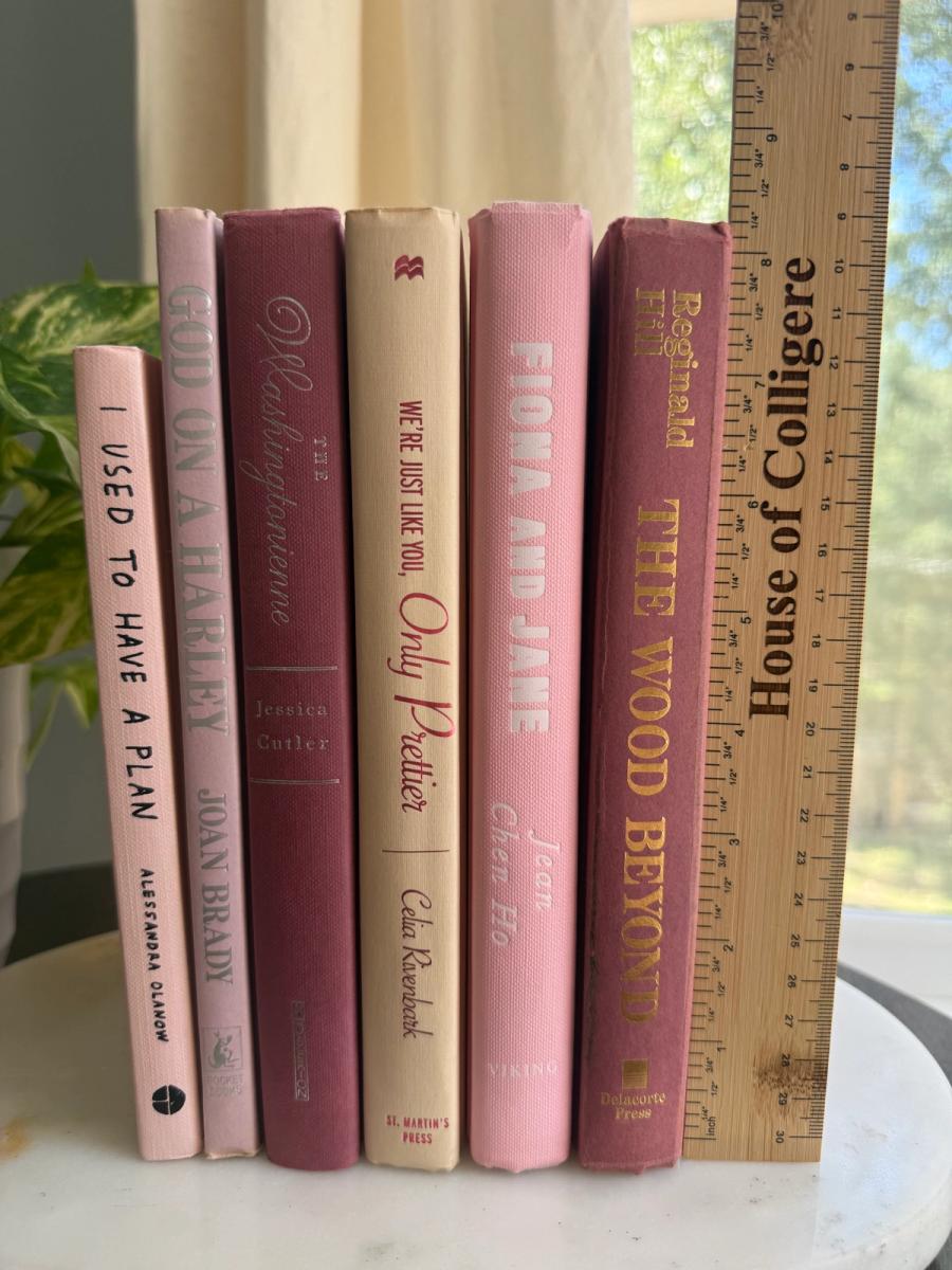Curated collection of blush, dusty rose, warm taupe, and softly muted neutral books.