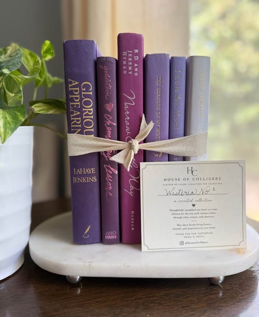 Curated collection of lavender, lilac, orchid, and violet books with soft tonal variation and floral-inspired color.