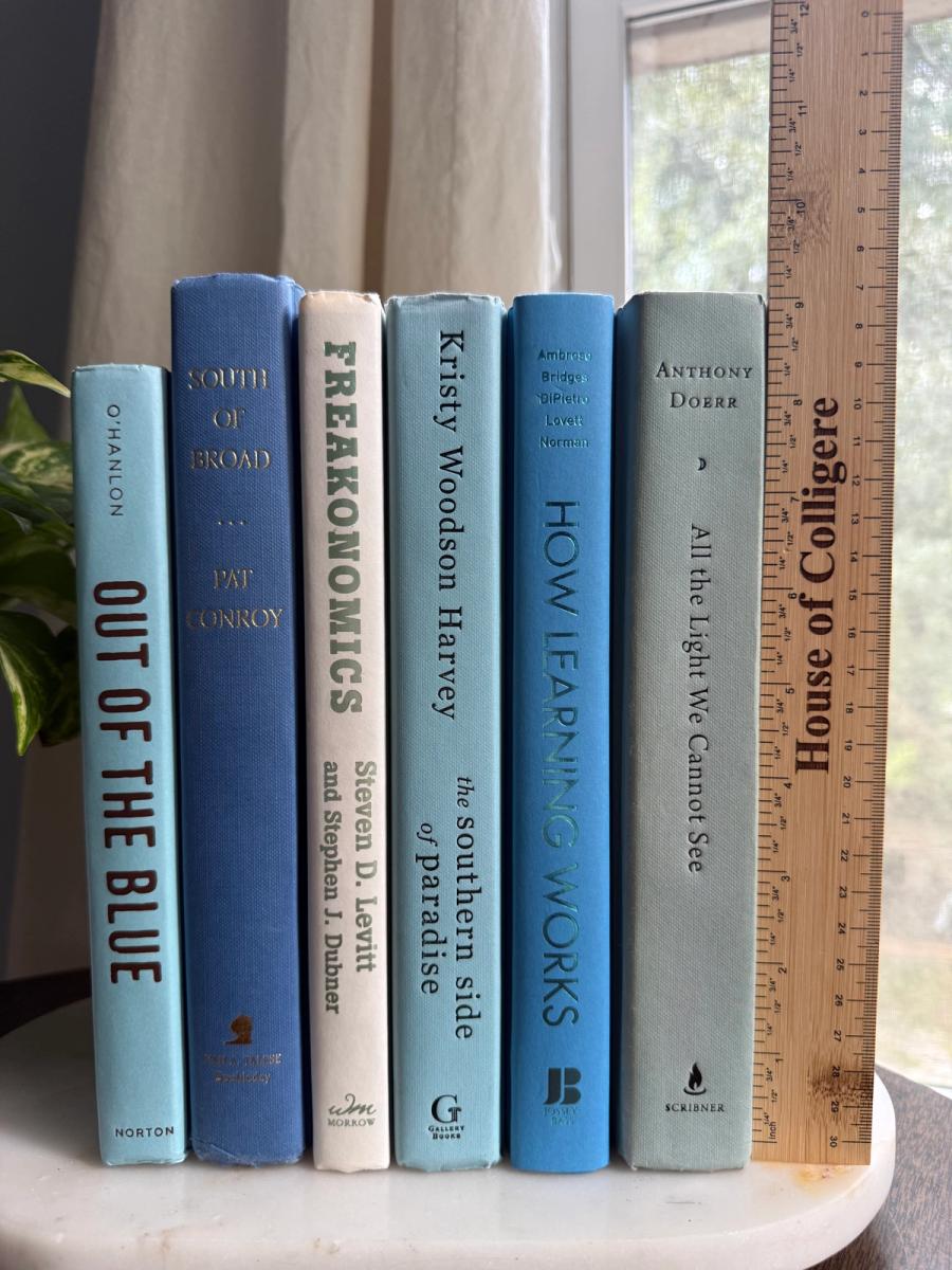 Curated collection of soft blue, aqua, seafoam, and muted coastal-toned books.