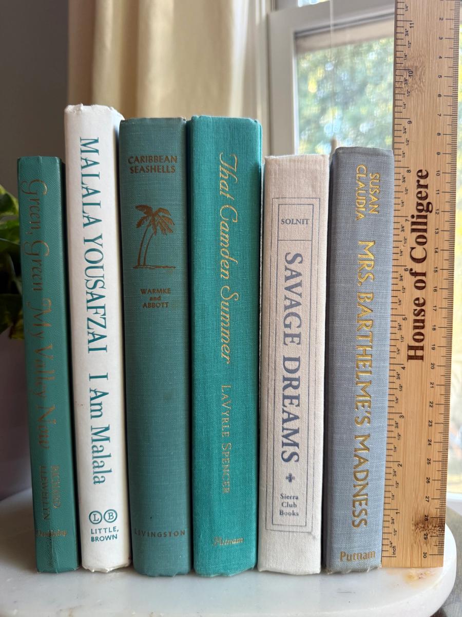 Curated collection of soft blue, aqua, seafoam, and muted coastal-toned books.