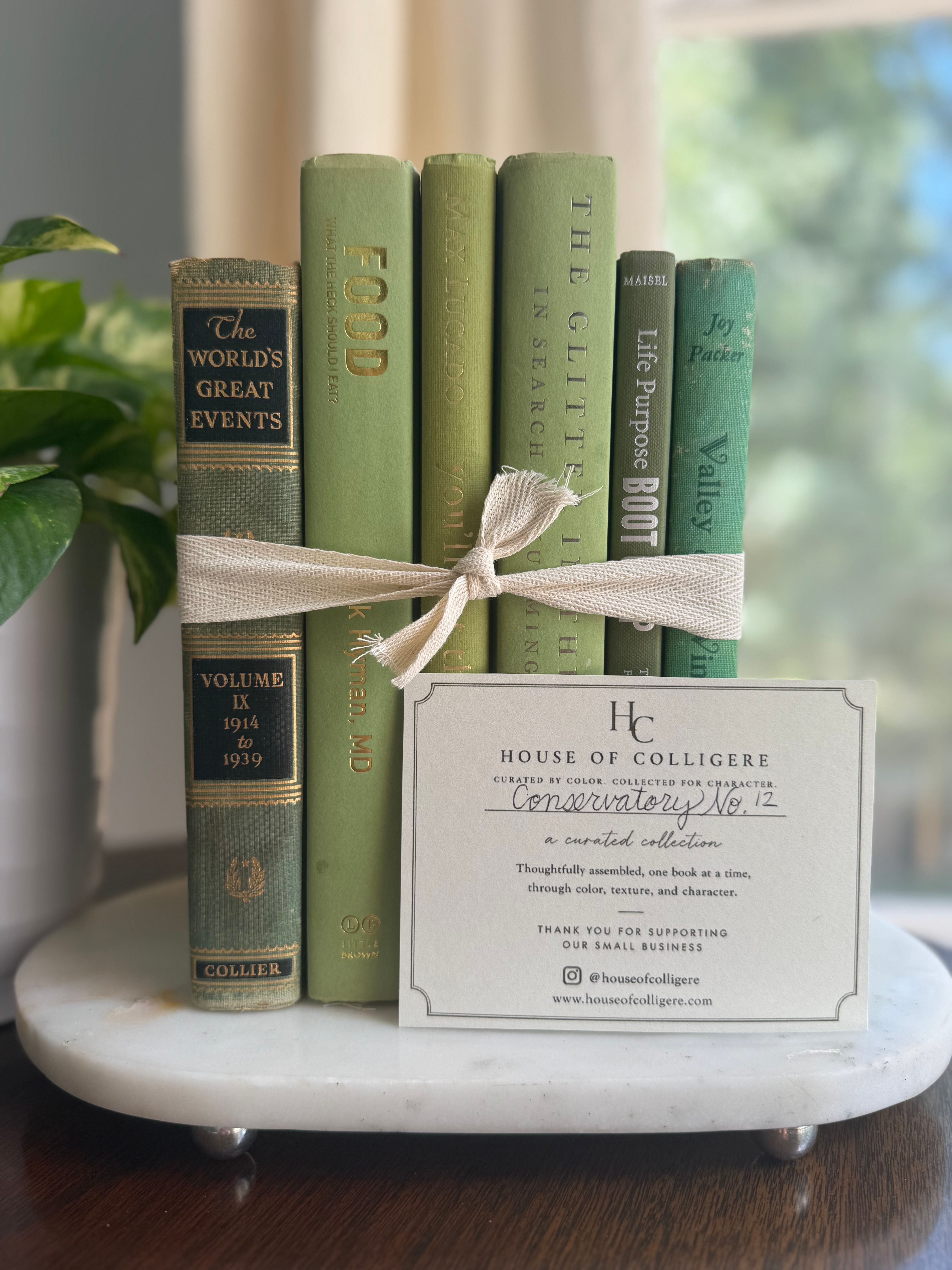 Curated collection of green books ranging from soft sage and olive to deeper botanical tones.