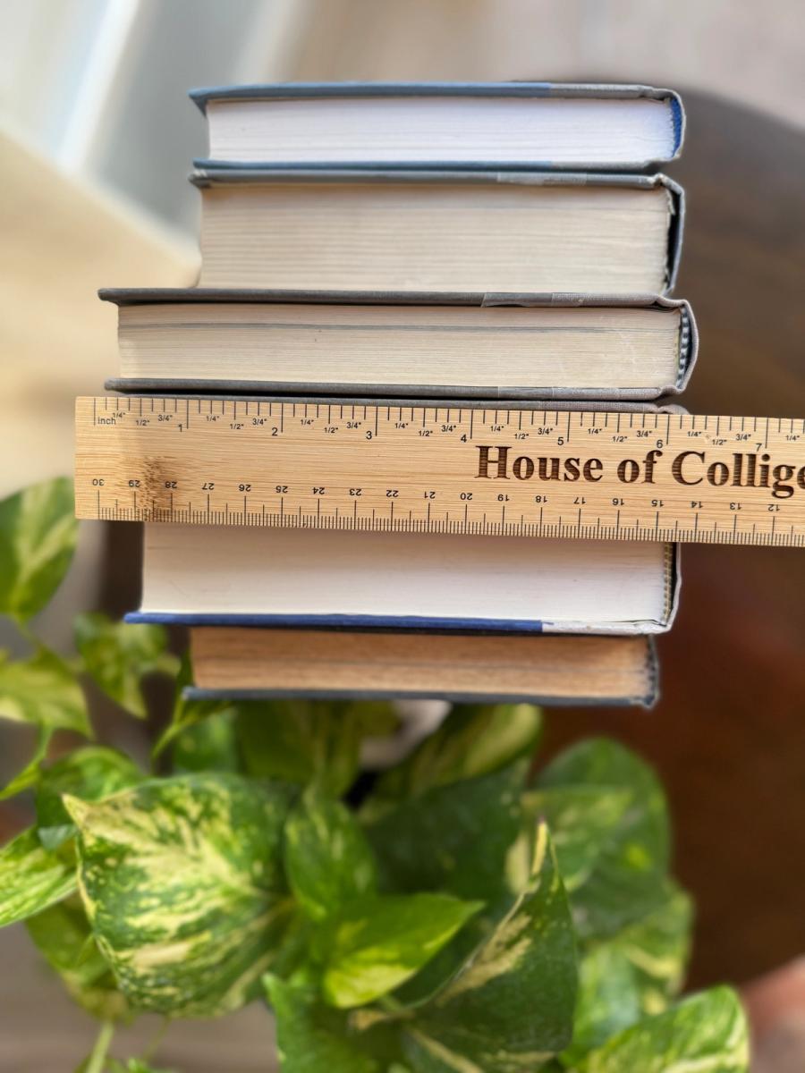 Curated collection of muted blue-gray, slate, charcoal, and softly weathered neutral books.