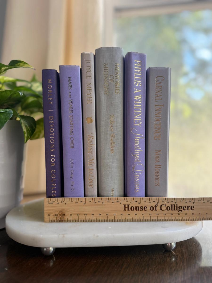 Curated collection of lavender, lilac, orchid, and violet books with soft tonal variation and floral-inspired color.