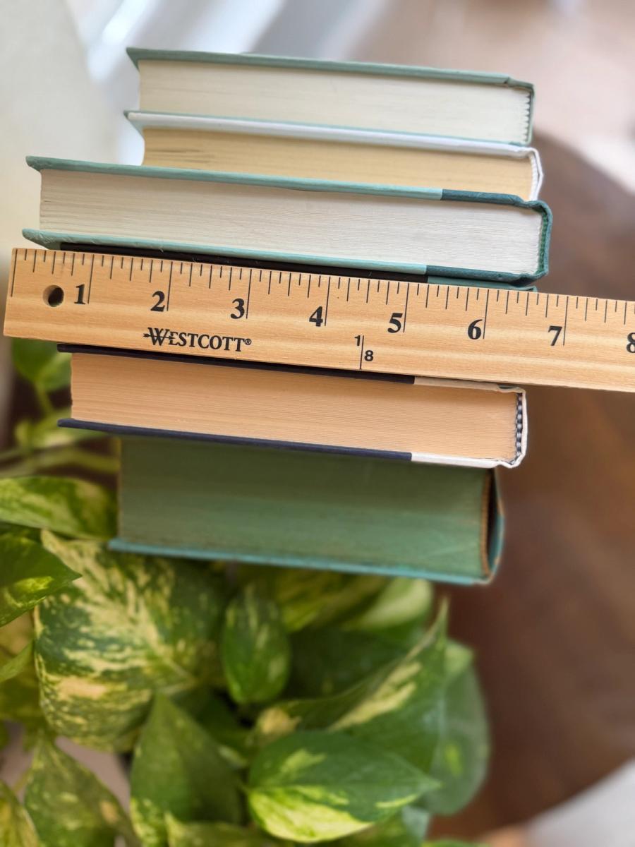 Curated collection of soft blue, aqua, seafoam, and muted coastal-toned books.